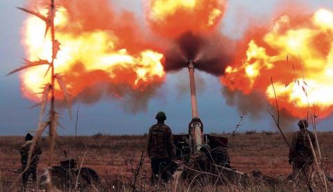 Cannons of the Azerbaijani army fire at Armenian fortifications in Karabakh