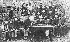 Group of teachers and students of “Madrasah-Saadet” school. Music teacher Uzeyir Hajibayov in the center